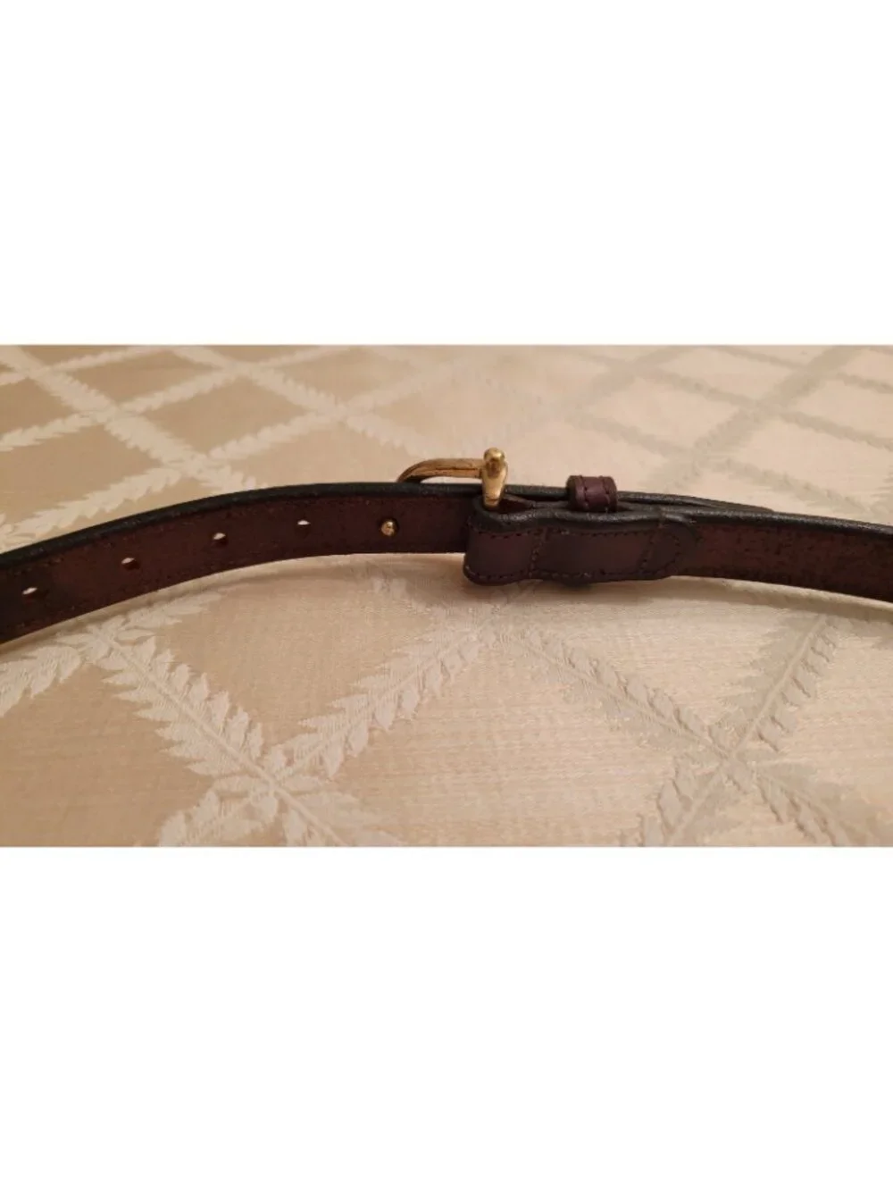 Tory Leather appears patina